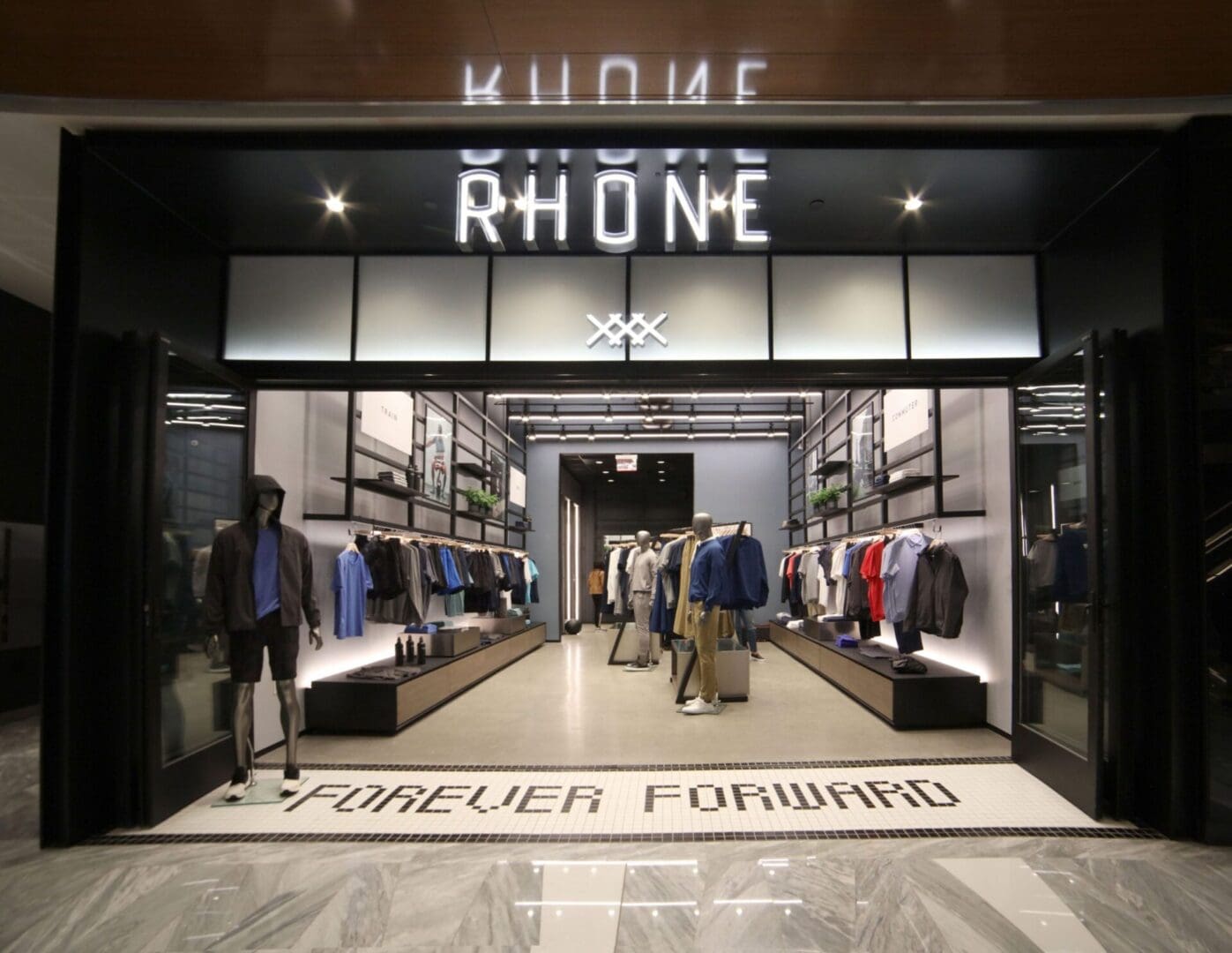 A store front with people walking around it.