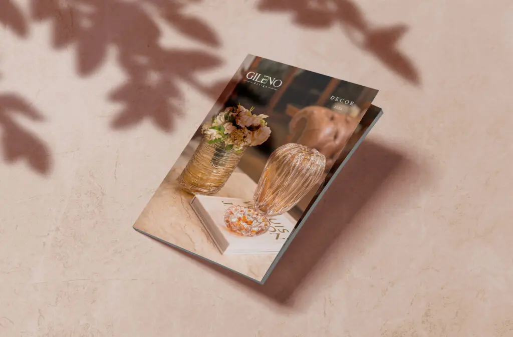 A book titled 'Ginger' with a cozy, warm-toned cover featuring a glass of ginger drink and ginger roots.